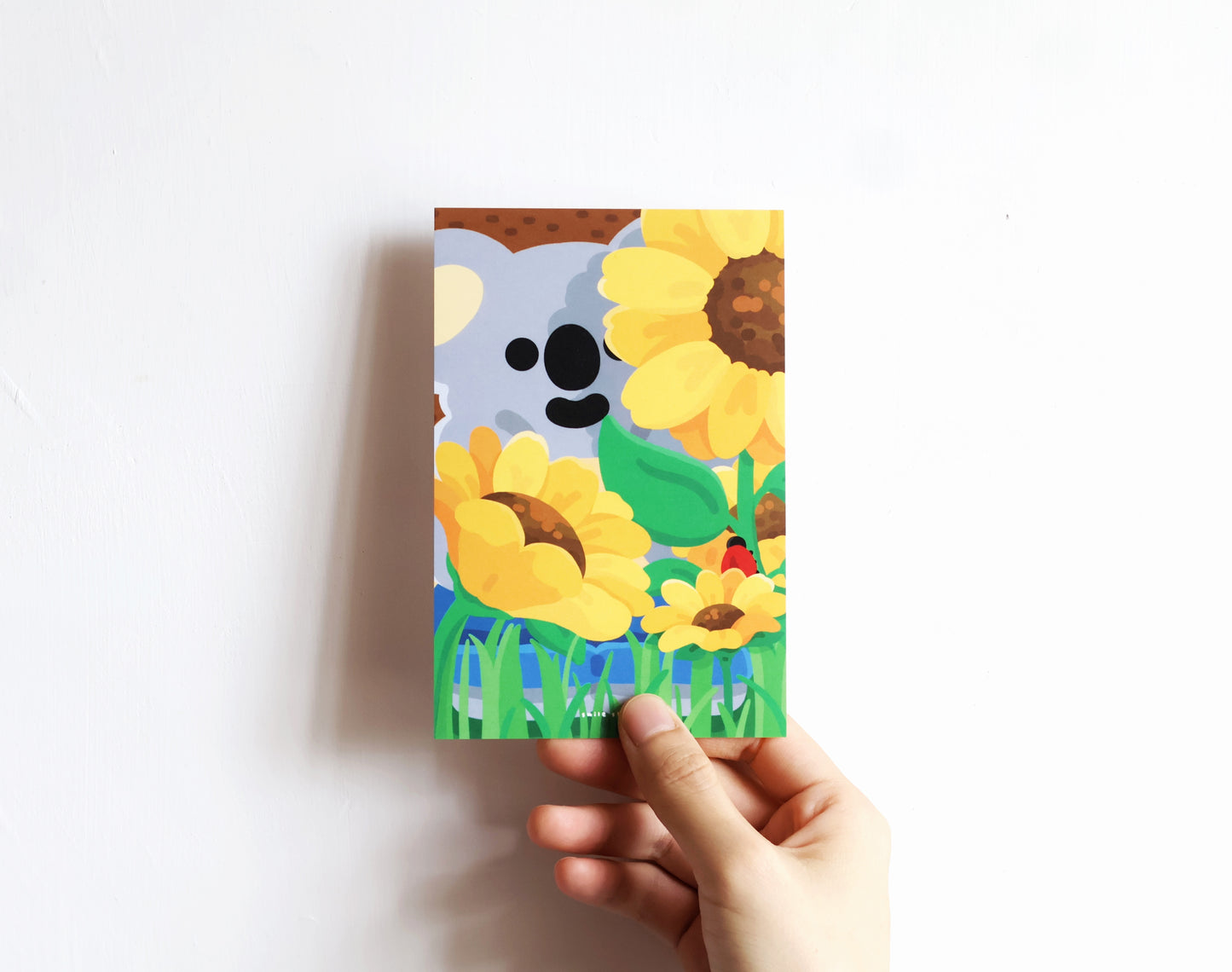 Kala Koala Bashful Behind the Bloom Art Print